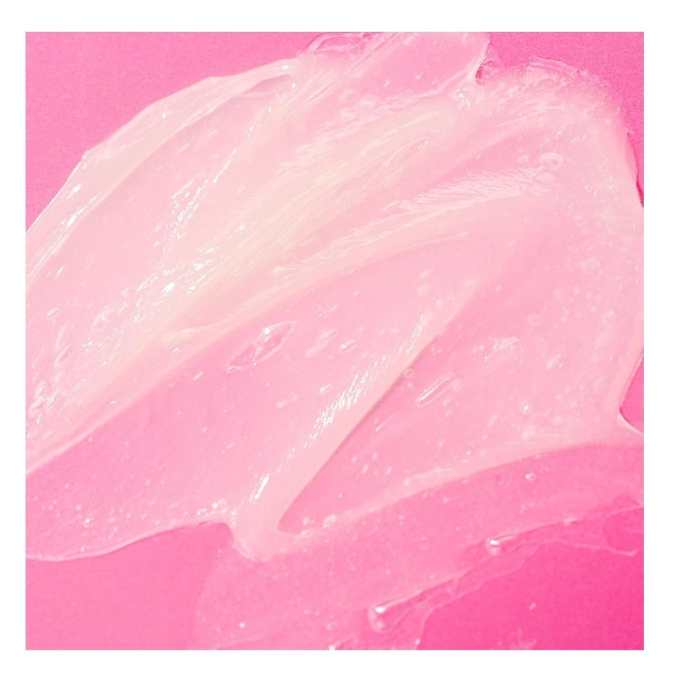 EOS Melon Magic lip balm texture swatch-White BG