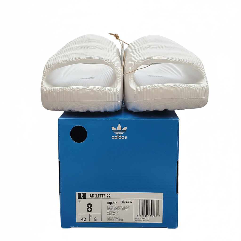 Adilette front on box white bg 1:1