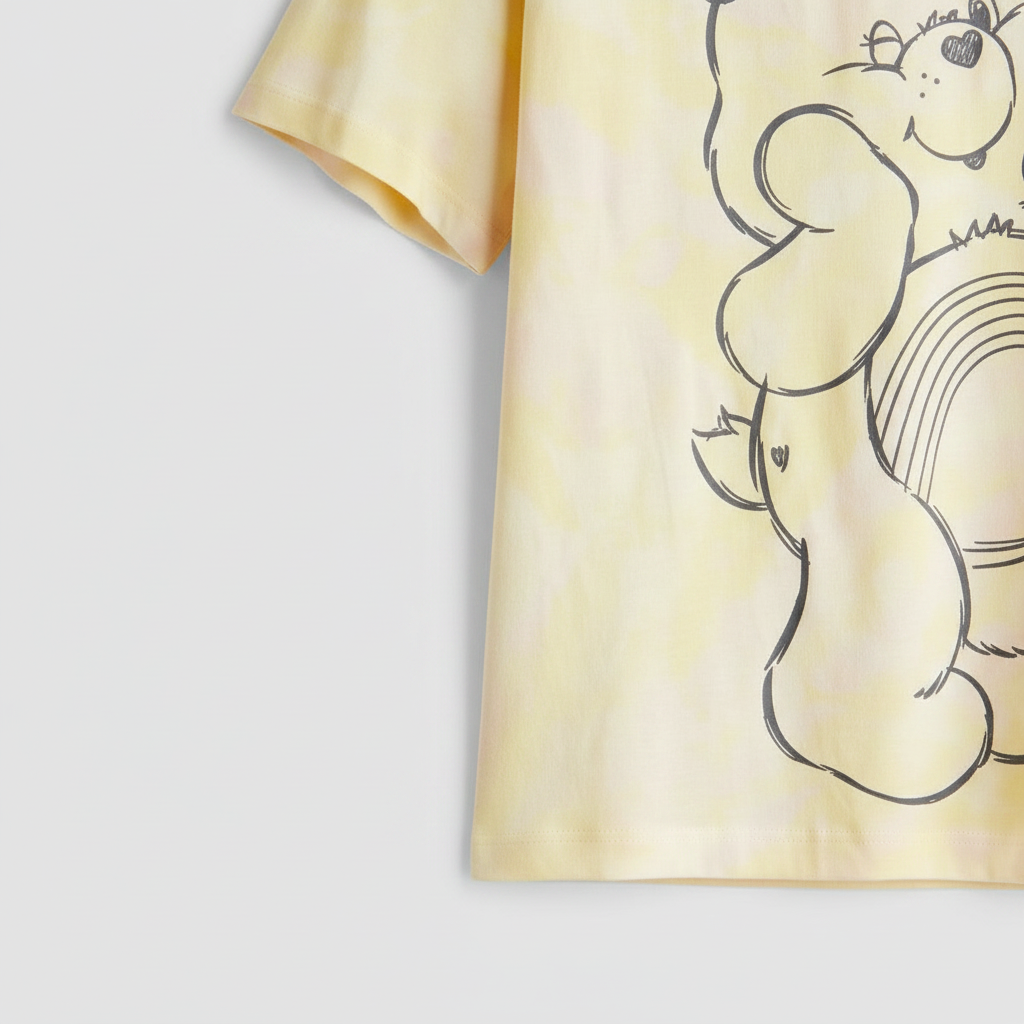hm-kids-oversized-tshirt-light-yellow-care-bears-sleeve-hem-detail-1x1