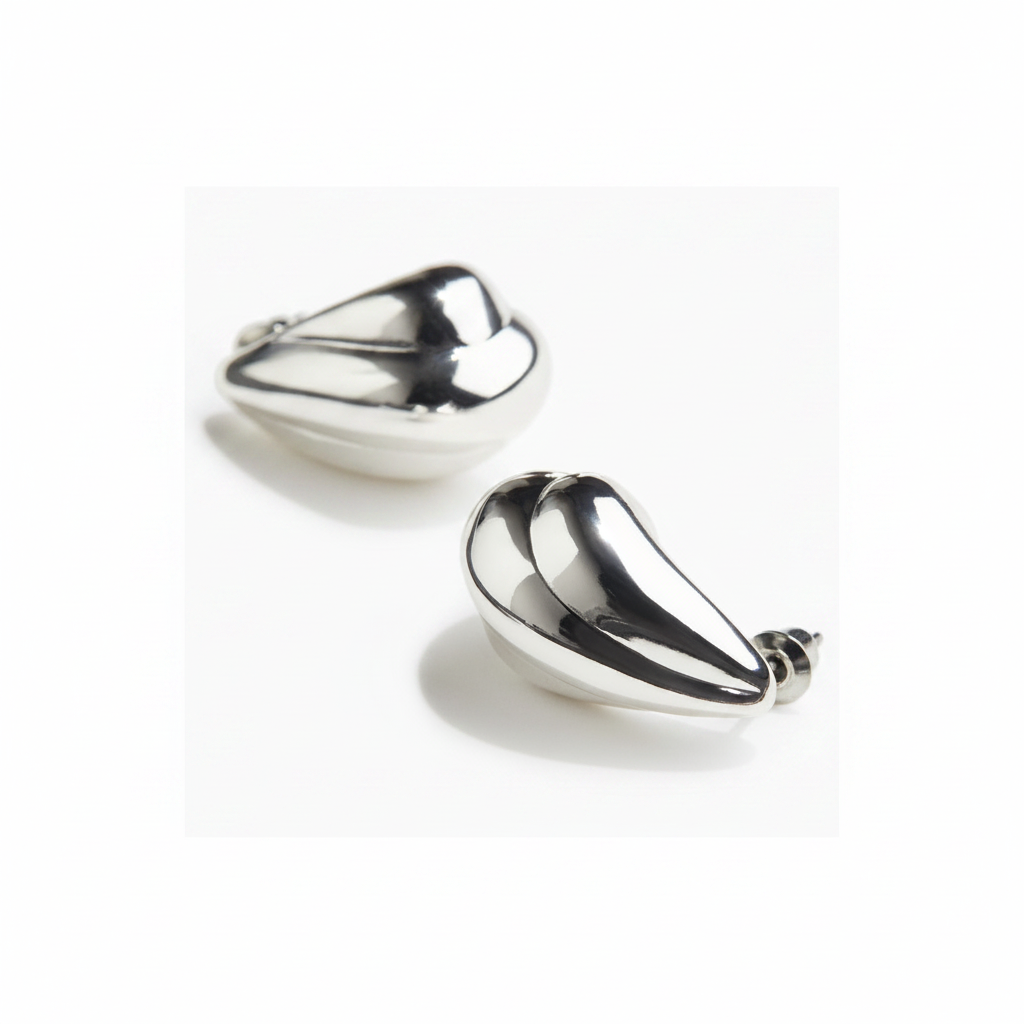 H&M Dome Earrings Leaf-Like Design – Silver side view showing earring posts on white background