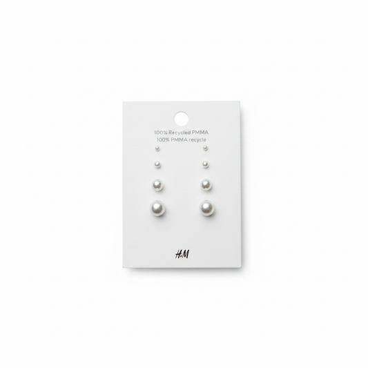 H&M 4 Pack Stud Beaded Earrings – Pearl stud earring card with 4 graduating sizes on white background